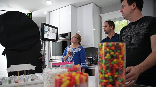 Crew and clients are reviewing a shot on a monitor during a commercial video production in NJ