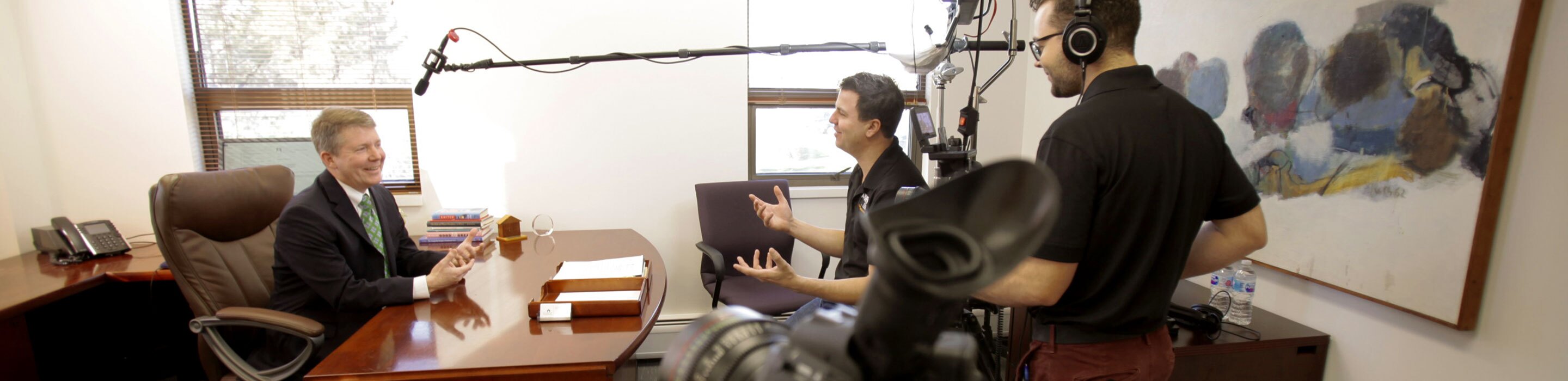 the crew laughs on set during a NJ Nonprofit Video Production