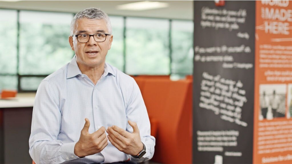 CEO of a fortune 500 corporation is filmed for a corporate video