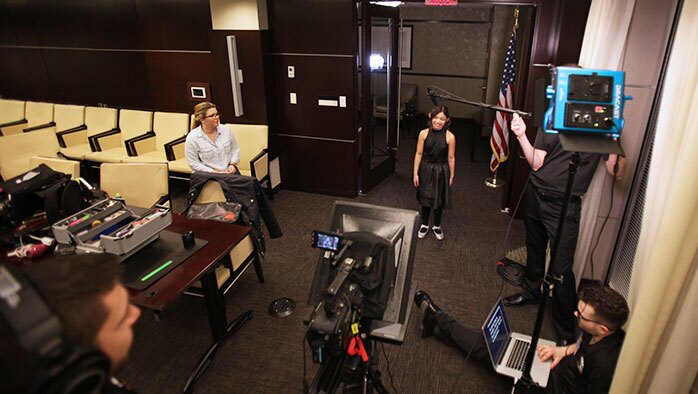 a spokeswoman is filmed fir a NJ nonprofit production