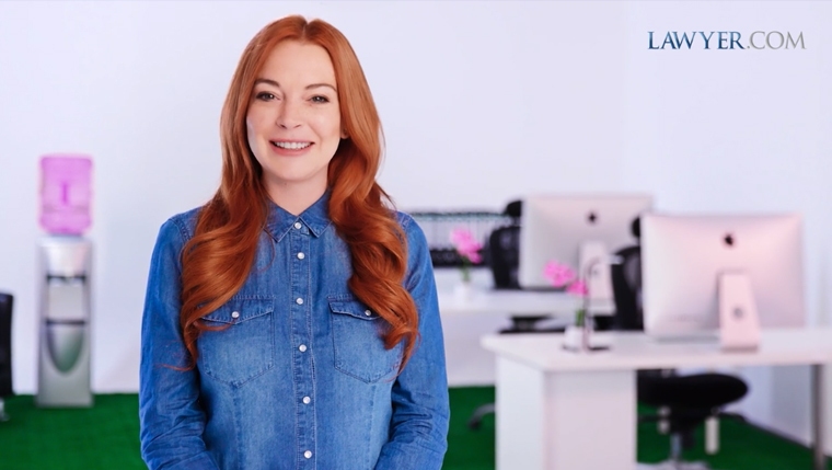 Celebrity actress Lindsey Lohan is filmed in a studio mockup office setting for a viral video production in NJ
