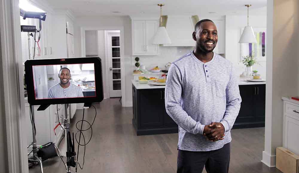 An african american actor poses for a TV commercial production with Awakened Films