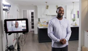 The talent smiles to camera on this Awakened Films New Jersey video production shoot