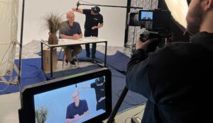 A business owner prepares to film a corporate video in a NJ Production Studio