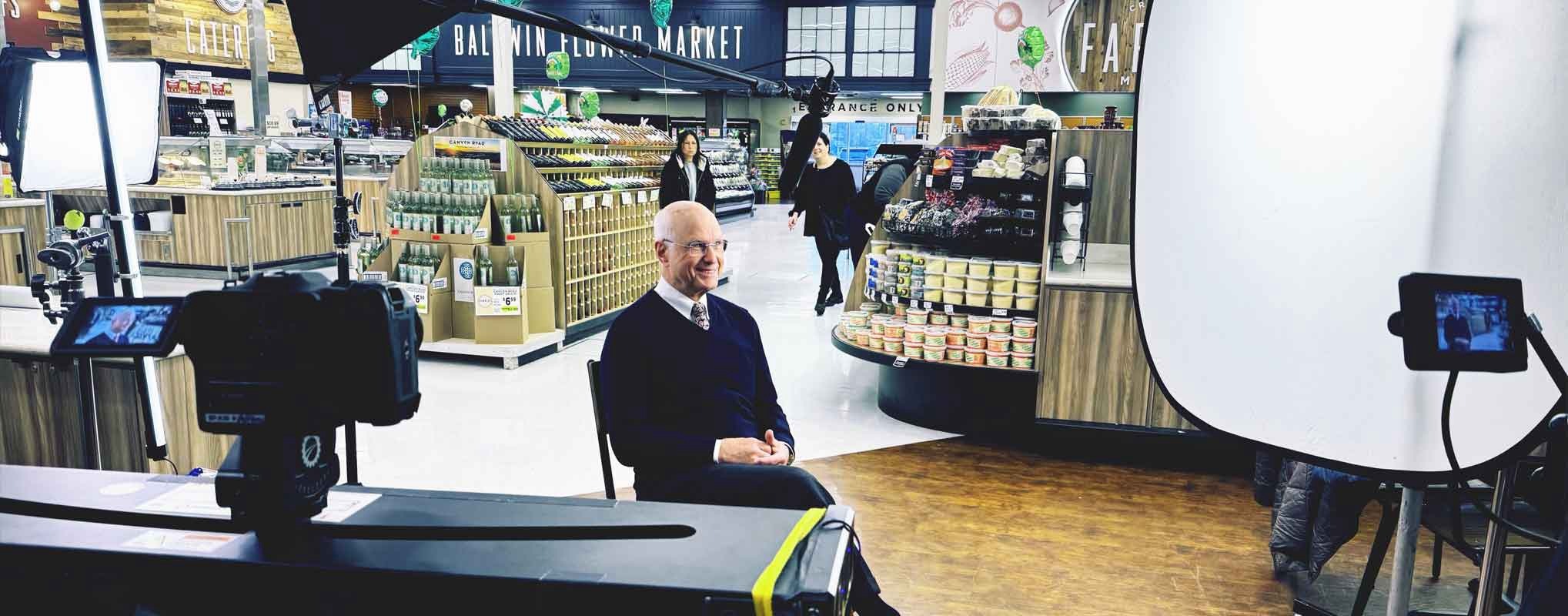 A business owner poses for a video marketing shoot in NJ