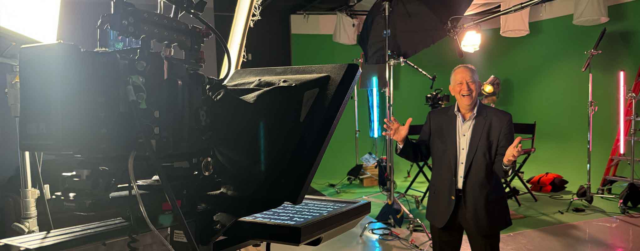 A business man prepares to film a corporate video