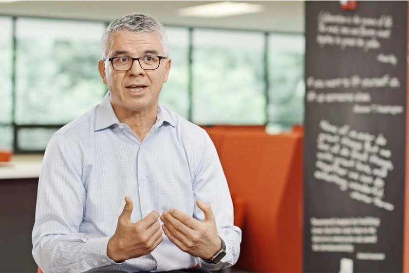 CEO of a fortune 500 corporation is filmed for a corporate video
