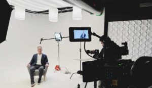 A business executive is filmed in our NJ corporate studio.