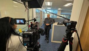 Cameras pointing at interviewee during corporate video production