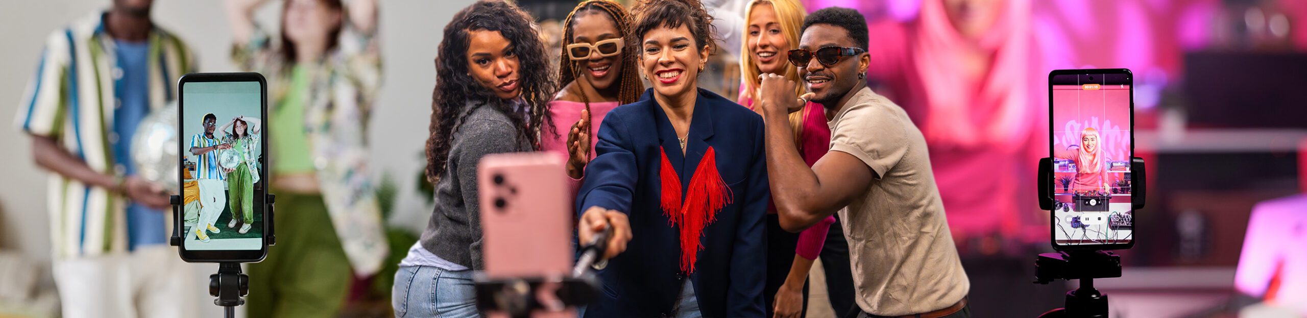 a group of women smiling and taking a selfie for social media