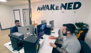 New Jersey Video Editors work on mac computers at the studios at awakened films