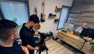 A New Jersey Video Company Films an entrapreneuer at a desk
