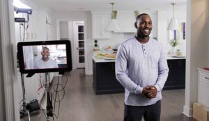 An African American actor poses for a TV commercial production with Awakened Films