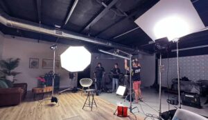 Crew prepares the cameras and lighting at The Studios at Awakened Films before a TV commercial film shoot