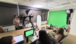 Awakened Films' video marketing crew is set and ready to film a green screen shoot in a corporate building